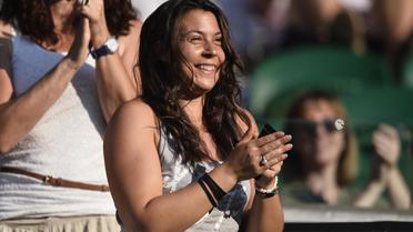 Marion Bartoli applaudit lors de la finale du double mixte de Wimbledon, le 7 juilet 2013 [Adrian Dennis / AFP/Archives]