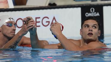 Les Français Florent Manaudou (d) et Frédérick Bousquet, lors des séries du 50 m nage libre, le 2 août 2013 aux Mondiaux de Barcelone [Lluis Gene / AFP]