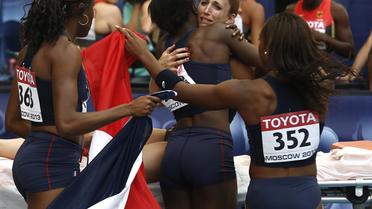 Les relayeuses françaises à l'issue du 4x100 m des Mondiaux de Moscou, le 23 août 2013 [Franck Fife / AFP]