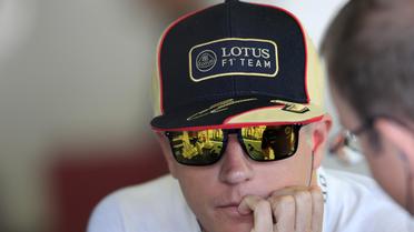 La pilote finlandais de Lotus Kimi Raïkkönnen, qui repassera en 2014 chez Ferrari, au cours d'un essai libre sur le circuit de Monza (Italie) le 7 septembre 2013 [ / AFP]