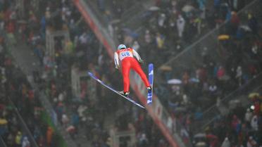 Jason Lamy Chappuis lors du concourt de saut comptant pour l'épreuve sur grand tremplin de combiné nordique, le 18 février 2014 sur le tremplin RusSki Gorki, à Rosa Khoutor [John MacDougall / AFP]