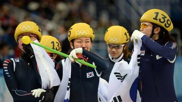 Les Sud-Coréennes célèbrent leur victoire dans le relais, épreuve de short-track des jeux Olympiques 2014, le 18 février 2014 à Sotchi [Yuri Kadobnov / AFP]