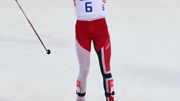 Le Norvégien Joergen Graabak devient champion olympique de combiné nordique au grand tremplin, le 18 février 2014 à Rosa Khoutor  [John MacDougall / AFP]