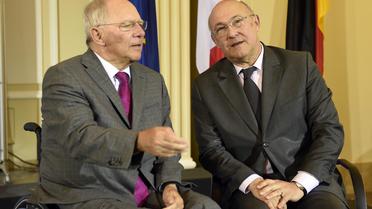 Le ministre français des Finances Michel Sapin et son homologue allemand, Wolfgang Schaüble, à Berlin le 7 avril 2014 [Odd Andersen / AFP]