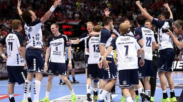 Les joueurs de Flensburg fêtent leur qualification pour la finale de la Ligue des champions, le 31 mai 2014 à Cologne [Marius Becker / DPA/AFP]