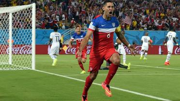 L'attaquant américain Clint Dempsey célèbre son but marqué après 30 secondes de jeu contre le Ghana, le 16 juin 2014 à Natal lors du Mondial [Carl De Souza / AFP]