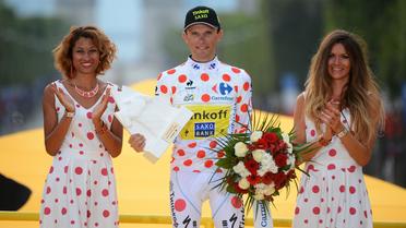 Le Polonais Rafal Majka, maillot à pois du dernier Tour de France, sur le podium à Paris après la 21e et dernière étape, le 27 juillet 2014. [Jérôme Provost / AFP/Archives]