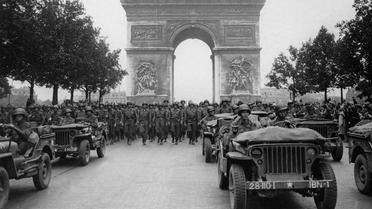 Défilé de troupes américaines sur les Champs Elysées, après la libération de Paris, le 28 aout 2014 [- / AFP]