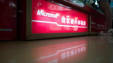 Le logo de Microsoft dans un magasin d'électronique de Shangaï en Chine, le 29 juillet 2014 [Johannes Eisele / AFP]
