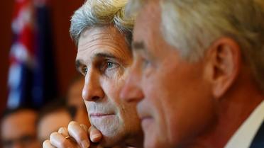Le secrétaire d’État John Kerry et son homologue de la Défense Chuck Hagel en visite à Sydney (Australie), le 12 août 2014 [Dan Himbrechts / Pool/AFP]