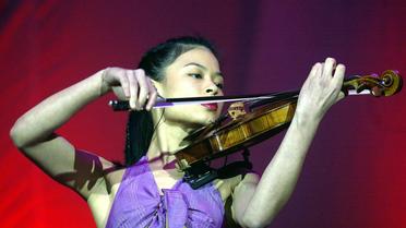 Vanessa Mae lors d'un concert à Hong Kong, le 19 septembre 2002 [Peter Parks / AFP/Archives]