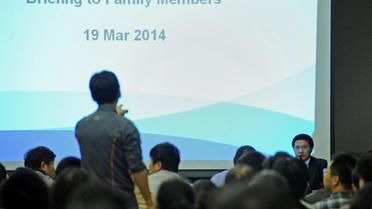 Conférence de presse d'un représentant de la Malaysian Airlines, le 19 mars 2014 à Pékin