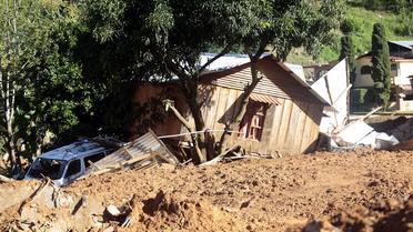 Une maison emportée par une coulée de boue, le 19 septembre 2013 à La Pintada, dans l'Etat de Guerrero, au Mexique [Pedro Pardo / AFP/Archives]