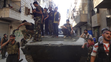 Des rebelles syriens à Alep le 8 juillet 2013 [Abo Mhio / AFP]