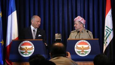 Le ministre français des Affaires étrangères Laurent Fabius (g) et le président du Kurdistan irakien Massoud Barzani lors d'une conférence de presse conjointe, le 10 août 2014 à Erbil [Safin Hamed / AFP]