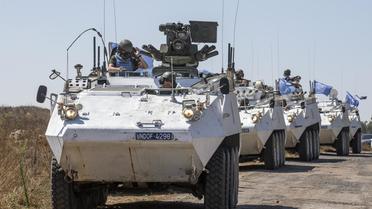 Un convoi de l'ONU sur le plateau du Golan, le 28 août 2014 [Jack Guez / AFP]