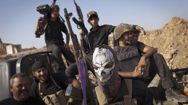 Des miliciens irakiens chiites lors d'affrontements contre des combattants de l'Etat islamique, le 31 août 2014 à Tuz Khurmatu, au sud de Kirkouk [J.M Lopez / AFP]