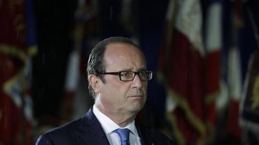 François Hollande lors de la célébration du 70e anniversaire de la Libération, le 25 août 2014 dans la soirée à Paris [Joël Saget / AFP]