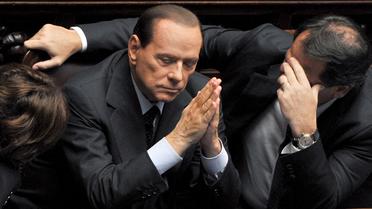 Silvio Berlusconi (C) à Rome, le 14 septembre 2013 [Alberto Pizzoli / AFP/Archives]