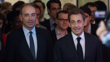 Jean-François Copé (G) et Nicolas Sarkozy au siège de l'UMP à Paris, le 8 juillet 2013 [Martin Bureau / AFP/Archives]
