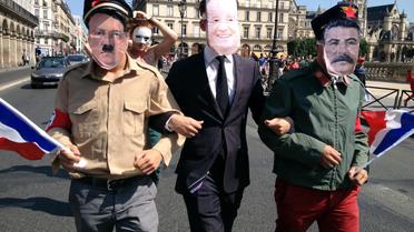 Les Hommen défilent à Paris le 14 juillet 2013 [Guillaume Faure / AFP]