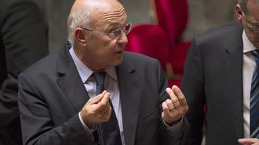 Le ministre du Travail Michel Sapin le 9 octobre 2013 à l'Assemblée nationale à Paris [Fred Dufour / AFP]