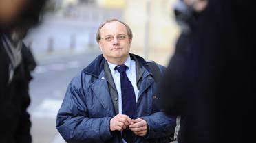 Le docteur Jean-Louis Muller arrive au tribunal à Nancy, le 21 octobre 2013 [ / AFP/Archives]
