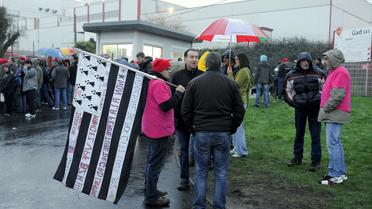 D'ex-employés de la société d'abattage Gad devant le site de Lampaul-Guimiliau, le 13 décembre 2013 [Fred Tanneau / AFP/Archives]