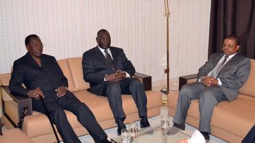Le président tchadien Idriss Déby, le président centrafricain Michel Djotodia et le Premier ministre centrafricain Nicolas Tiangaye à N'Djamena à la veille du sommet de l'Afrique centrale sur la situation en Centrafrique, le 8 janvier 2014 [Brahim Adji / AFP]