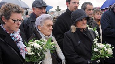 Des proches des victimes du naufrage du Bugaled Breizh, il ya dix ans, le 18 janvier 2014 à Loctudy (Finistère) [Fred Tanneau / AFP]