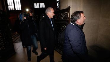 Le gynécologue André Hazout arrive au palais de justice de Paris où il est jugé pour viols, le 4 février 2014 [Thomas Samson / AFP]