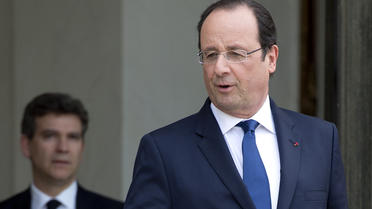 François Hollande et Arnaud Montebourg (G) le 29 avril 2014 à l'Eylsée à Paris [Alain Jocard / AFP/Archives]