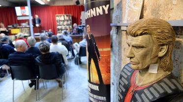 Vente aux enchères de la collection d'un fan de Johnny Hallyday à Bordeaux, le 17 mai 2014 [Mehdi Fedouach / AFP]