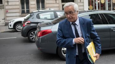 Le ministre du Travail François Rebsamen, devant le siège du Parti socialiste (PS), à Paris, le 27 mai 2014 [Fred Dufour / AFP/Archives]