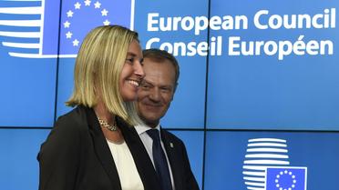 L'Italienne Federica Mogherini, nouvelle chef de la diplomatie européenne, et le Polonais Donald Tusk, nouveau président du Conseil européen, lors d'un sommet de l'UE à Bruxelles le 30 août 2014 [John Thys / AFP]