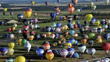 Des montgolfières décollent le 31 juillet 2013 de Chambley-Bussières (est), à l'occasion du Lorraine Mondial Air Ballons [Alexandre Marchi / Pool/AFP]