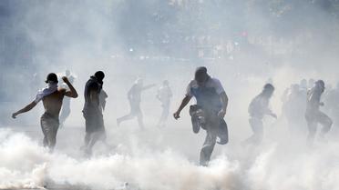 Affrontements entre des manifestants et la police sur la place de la République, à Paris, en marge d'une manifestation propalestinienne interdite, le 26 juillet 2014 [François Guillot  / AFP/Archives]