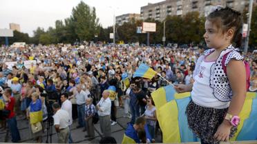 Manifestation à Marioupol dans la région de Donetsk le 28 aout 2014 demandant une Ukraine unie et le retrait des troupes russes [Alexander Khudoteply / AFP]