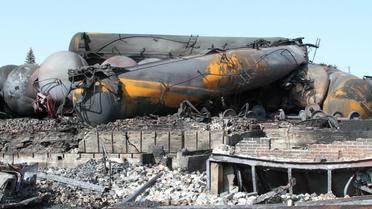 Des wagons brûlés après l'accident ferroviaire au Lac-Mégantic, au Canada, le 12 juillet 2013 [- / Sûreté du Quebec/AFP]