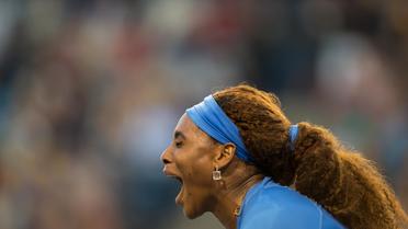 Serena Williams célèbre un point marqué en demi-finale du tournoi de Toronto, le 10 août 2013 face à la Polonaise Agnieszka Radwanska [Geoff Robins / AFP/Archives]
