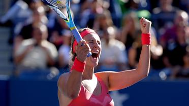 Victoria Azarenka après sa victoire 6-4, 6-2 sur Flavia Pennetta en demi-finale de l'US Open le 6 septembre 2013 à New York [Stan Honda / AFP]