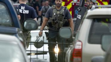 Des membres d'une unité tactique de la police, le 16 septembre 2013 à Washington   [Saul Loeb / AFP]