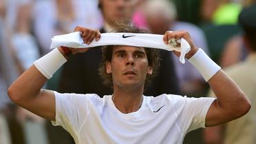 L'Espagnol Rafael Nadal lors de son huitième de finale contre l'Australien Nick Kyrgios à Wimbledon, le 30 juillet 2014. [Carl Court / AFP/Archives]