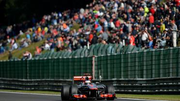 Le Britannique Jenson Button (McLaren-Mercedes) partira en pole position dimanche au Grand Prix de Belgique, 12e manche du Championnat du monde de Formule 1, après avoir signé le meilleur temps des qualifications samedi devant le Japonais Kamui Kobayashi (Sauber-Ferrari).[AFP]