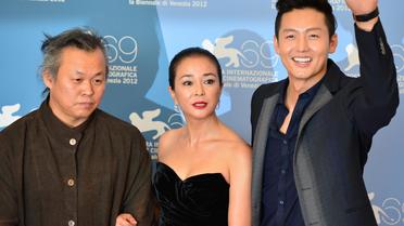 Le réalisateur sud-coréen Kim Ki-duk a présenté mardi en compétition à Venise "Pieta", une oeuvre sombre aux accents oedipiens sur la tentative de rédemption d'un petit malfrat qui redécouvre sa part d'humanité.[AFP]