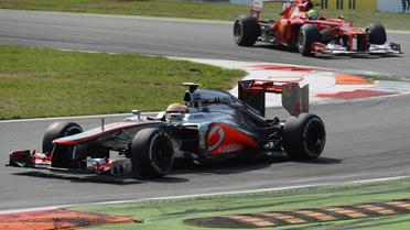 Le Britannique Lewis Hamilton (McLaren), parti en pole position, a remporté dimanche le Grand Prix d'Italie, 13e manche du Championnat du monde de Formule 1, devant le Mexicain Sergio Pérez (Sauber) et l'Espagnol Fernando Alonso (Ferrari). [AFP]