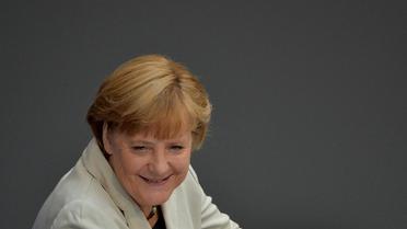 La chancelière Angela Merkel a salué mercredi le feu vert de la Cour constitutionnelle allemande au plan de sauvetage de l'euro qui marque selon elle "une bonne journée pour l'Europe". [AFP]