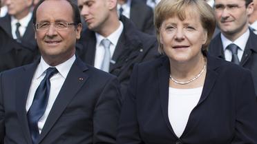 Le président français François Hollande et la chancelière allemande Angela Merkel, à Ludwigsburg, le 22 septembre 2012, pour les célébrations du 50e anniversaire de l'amitié franco-allemande [Carsten Koall / AFP]