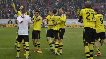 Les joueurs de Dortmund fêtent leur succès à Stuttgart, le 30 mars 2013 [Thomas Kienzle / AFP]