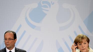 Le président François Hollande et la chancelière Angela Merkel, le 15 mai 2012 à Berlin [Odd Andersen / AFP]